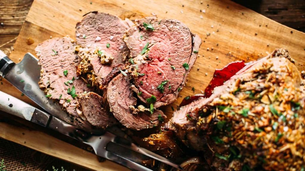 Divine Garlic-Stuffed Boneless Leg of Lamb: Irresistible Recipe!