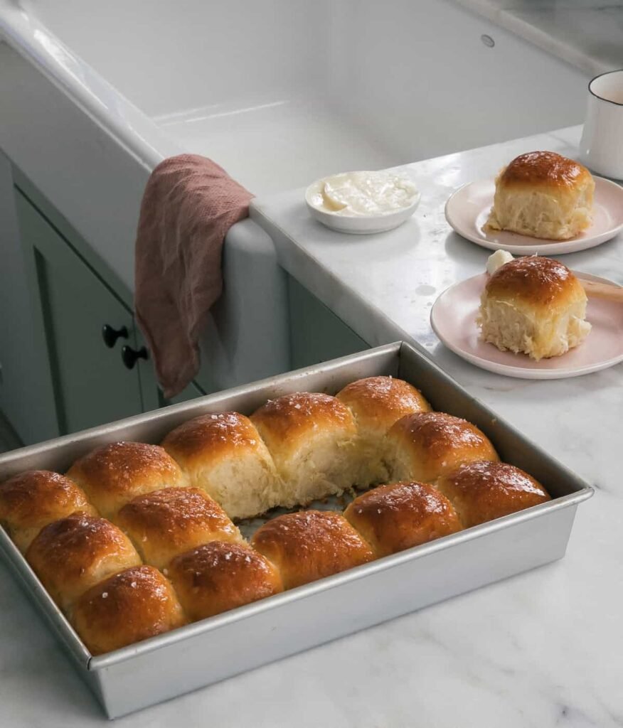 Salted Honey Parker House Rolls plated.